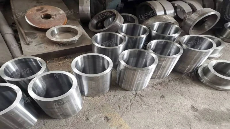 Low temperature steel cylinder free forging